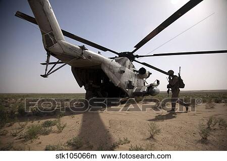 U. S. Marines board a CH-53D Sea Stallion helicopter in Afghanistan. View Large Photo Image Picture - U. S. Marines board a CH-53D Sea Stallion helicopter in Afghanistan.. Fotosearch