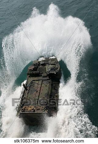 U. S. Marines drive an assault amphibious vehicle in the Pacific Ocean. View Large Photo Image Picture - U. S. Marines drive an assault amphibious vehicle in the Pacific Ocean.. Fotosearch