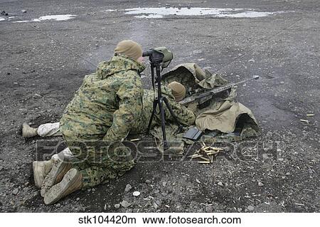 Picture - U. S. Marines fire an M107 special application scoped rifle at Camp Fuji, Japan.. Fotosearch
