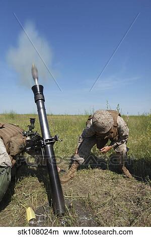 U. S. Marines fire an M252 81mm mortar system. View Large Photo Image Picture - U. S. Marines fire an M252 81mm mortar system.. Fotosearch