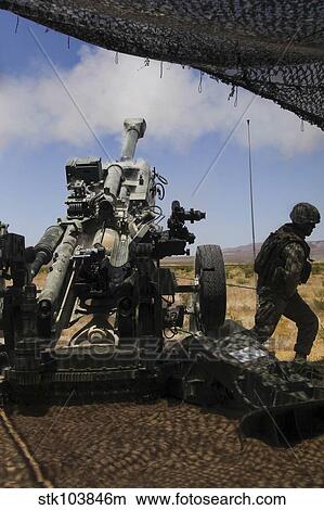 U. S. Marines fire an M777 howitzer. View Large Photo Image Picture - U. S. Marines fire an M777 howitzer.. Fotosearch