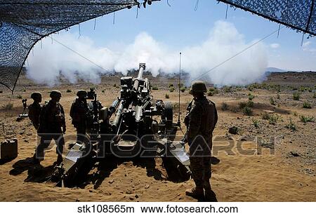 U. S. Marines fire the M777A2 Howitzer. View Large Photo Image Picture - U. S. Marines fire the M777A2 Howitzer.. Fotosearch