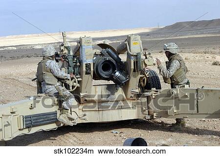 U. S. Marines prepare to fire a howitzer near Baghdad, Iraq. View Large Photo Image Picture - U. S. Marines prepare to fire a howitzer near Baghdad, Iraq.. Fotosearch