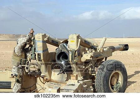 U. S. Marines prepare to fire a howitzer near Baghdad, Iraq. View Large Photo Image Picture - U. S. Marines prepare to fire a howitzer near Baghdad, Iraq.. Fotosearch