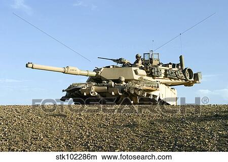 U. S. Marines provide security in an M1A1 Abrams tank. View Large Photo Image Picture - U. S. Marines provide security in an M1A1 Abrams tank.. Fotosearch
