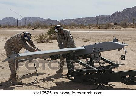 U. S. Marines start the engine of an RQ-7 Shadow. View Large Photo Image Picture - U. S. Marines start the engine of an RQ-7 Shadow.. Fotosearch