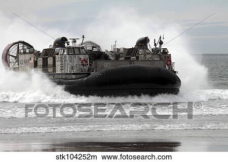 U. S. Navy Landing Craft Air Cushion makes a beach landing. View Large Photo Image Picture - U. S. Navy Landing Craft Air Cushion makes a beach landing.. Fotosearch