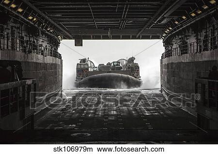 Picture - U. S. Navy landing craft air cushion enters the well deck of the USS Green Bay.. Fotosearch