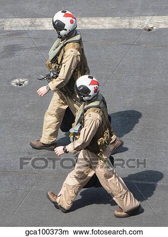 U. S. Navy pilots on the flight deck of USS Theodore Roosevelt. View Large Photo Image Picture - U. S. Navy pilots on the flight deck of USS Theodore Roosevelt.. Fotosearch