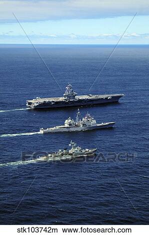U. S. Navy ships perform tactical maneuvering exercises in the Atlantic Ocean. View Large Photo Image Picture - U. S. Navy ships perform tactical maneuvering exercises in the Atlantic Ocean.. Fotosearch