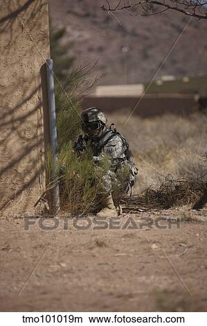U. S. Soldier conducts a combat training scenario at Playas Training Area, New Mexico. View Large Photo Image Picture - U. S. Soldier conducts a combat training scenario at Playas Training Area, New Mexico.. Fotosearch