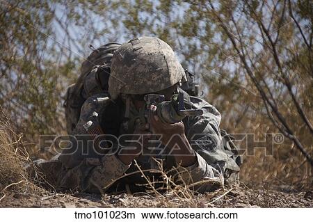 U. S. Soldier conducts a combat training scenario at Playas Training Area, New Mexico. View Large Photo Image Picture - U. S. Soldier conducts a combat training scenario at Playas Training Area, New Mexico.. Fotosearch