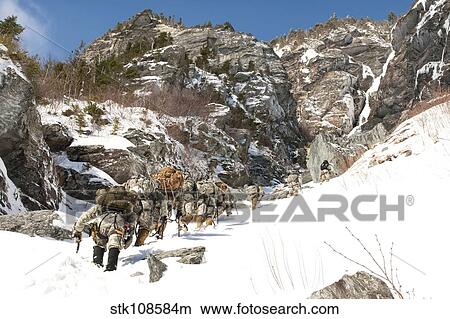 U. S. Soldiers climb Smugglers' Notch in Cambridge, Vermont. View Large Photo Image Picture - U. S. Soldiers climb Smugglers' Notch in Cambridge, Vermont.. Fotosearch