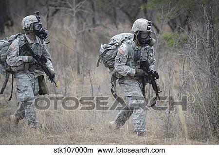 U. S. soldiers don chemical warfare gear. View Large Photo Image Picture - U. S. soldiers don chemical warfare gear.. Fotosearch