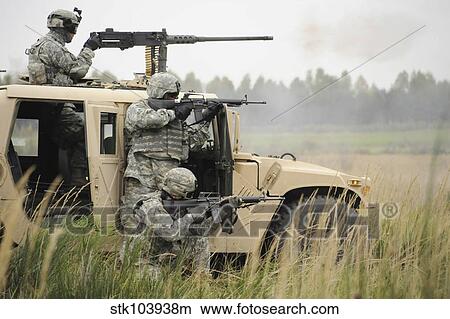 U. S. Soldiers perform a platoon mounted and dismounted live-fire exercise. View Large Photo Image Picture - U. S. Soldiers perform a platoon mounted and dismounted live-fire exercise.. Fotosearch