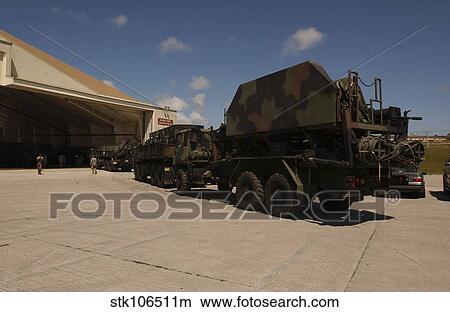 U. S. Soldiers transport Patriot Advanced Capability missiles into a hangar. View Large Photo Image Picture - U. S. Soldiers transport Patriot Advanced Capability missiles into a hangar.. Fotosearch