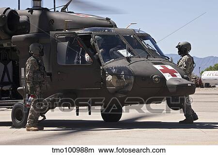 UH-60 Black Hawk refuels during exercise Angel Thunder 2013. View Large Photo Image Picture - UH-60 Black Hawk refuels during exercise Angel Thunder 2013.. Fotosearch