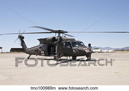 UH-60 Black Hawk refuels during exercise Angel Thunder 2013. View Large Photo Image Picture - UH-60 Black Hawk refuels during exercise Angel Thunder 2013. . Fotosearch