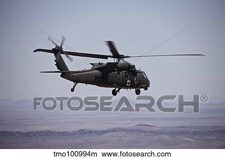 UH-60 Black Hawk takes off after refueling in New Mexico. View Large Photo Image Picture - UH-60 Black Hawk takes off after refueling in New Mexico.. Fotosearch