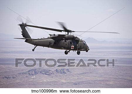 UH-60 Black Hawk takes off after refueling in New Mexico. View Large Photo Image Picture - UH-60 Black Hawk takes off after refueling in New Mexico.. Fotosearch