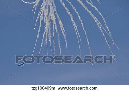 Ukrainian Air Force Su-27 Flanker releasing countermeasures. View Large Photo Image Picture - Ukrainian Air Force Su-27 Flanker releasing countermeasures.. Fotosearch