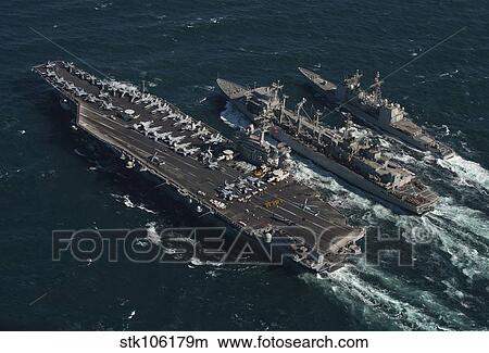 Underway replenishment at sea with U. S. Navy ships in the Arabian Gulf. View Large Photo Image Picture - Underway replenishment at sea with U. S. Navy ships in the Arabian Gulf.. Fotosearch