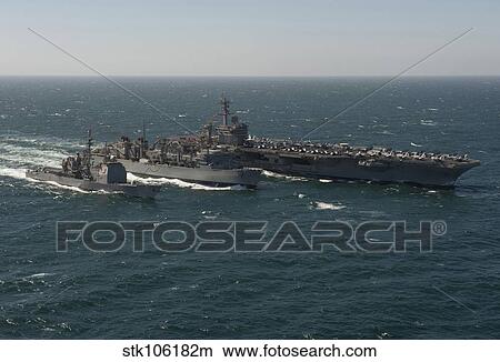 Underway replenishment at sea with U. S. Navy ships in the Arabian Gulf. View Large Photo Image Picture - Underway replenishment at sea with U. S. Navy ships in the Arabian Gulf.. Fotosearch