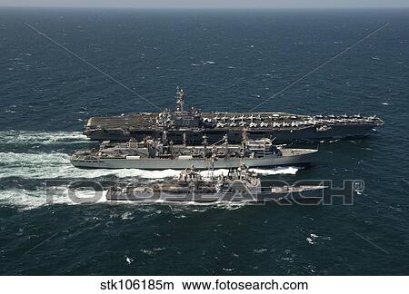 Underway replenishment at sea with U. S. Navy ships in the Arabian Gulf. View Large Photo Image Picture - Underway replenishment at sea with U. S. Navy ships in the Arabian Gulf.. Fotosearch