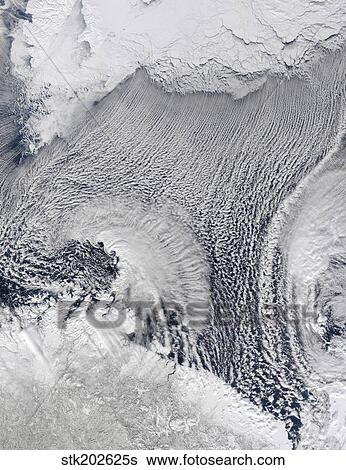 Unusual cloud formations over the Barents Sea. View Large Photo Image Stock Photograph - Unusual cloud formations over the Barents Sea.. Fotosearch