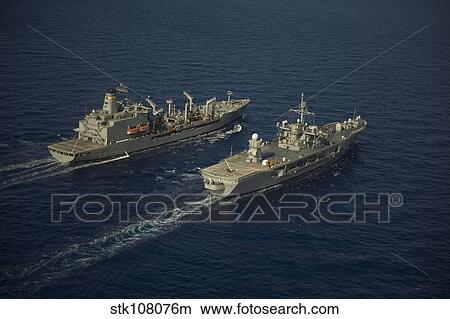USNS Leroy Grumman conducts a replenishment at sea with USS Mount Whitney. View Large Photo Image Picture - USNS Leroy Grumman conducts a replenishment at sea with USS Mount Whitney.. Fotosearch