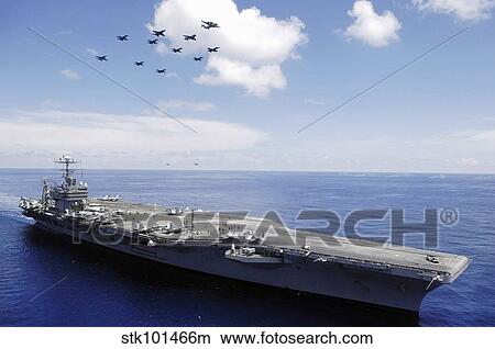 USS Abraham Lincoln and aircraft perform a aerial demonstration. View Large Photo Image Picture - USS Abraham Lincoln and aircraft perform a aerial demonstration.. Fotosearch