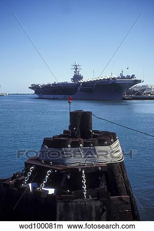 USS Abraham Lincoln docked pierside at Pearl Harbor Naval Station. View Large Photo Image Picture - USS Abraham Lincoln docked pierside at Pearl Harbor Naval Station.. Fotosearch