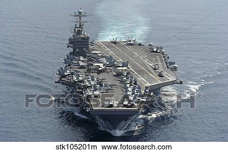 USS Abraham Lincoln transits the Indian Ocean. View Large Photo Image Picture - USS Abraham Lincoln transits the Indian Ocean.. Fotosearch