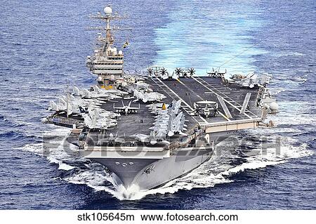 Picture - USS Abraham Lincoln transits the Pacific Ocean.. Fotosearch