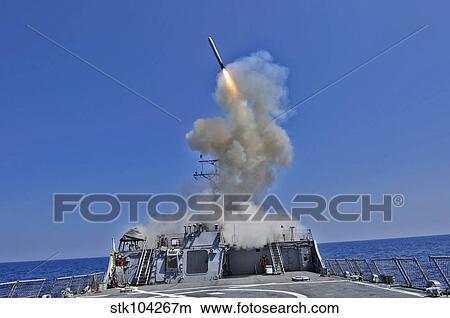 USS Barry launches a Tomahawk cruise missile. View Large Photo Image Picture - USS Barry launches a Tomahawk cruise missile.. Fotosearch