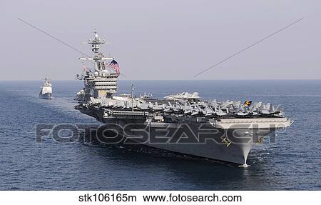 USS Carl Vinson and USS Bunker Hill transit the Pacific Ocean. View Large Photo Image Picture - USS Carl Vinson and USS Bunker Hill transit the Pacific Ocean.. Fotosearch