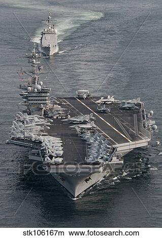 USS Carl Vinson and USS Bunker Hill transit the Strait of Malacca. View Large Photo Image Picture - USS Carl Vinson and USS Bunker Hill transit the Strait of Malacca.. Fotosearch
