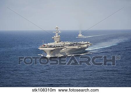 USS Carl Vinson and USS Sterett transit the Pacific Ocean. View Large Photo Image Picture - USS Carl Vinson and USS Sterett transit the Pacific Ocean.. Fotosearch