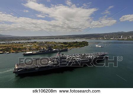 USS Carl Vinson passes the USS Missouri Memorial in Pearl Harbor. View Large Photo Image Picture - USS Carl Vinson passes the USS Missouri Memorial in Pearl Harbor.. Fotosearch