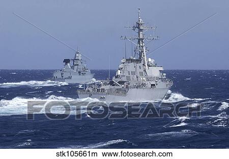 USS Carney practices diversion tactics with the German frigate Sachsen. View Large Photo Image Picture - USS Carney practices diversion tactics with the German frigate Sachsen.. Fotosearch