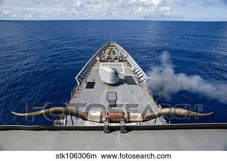 Picture - USS Cowpens fires its Mk 45 Mod 2 gun.. Fotosearch