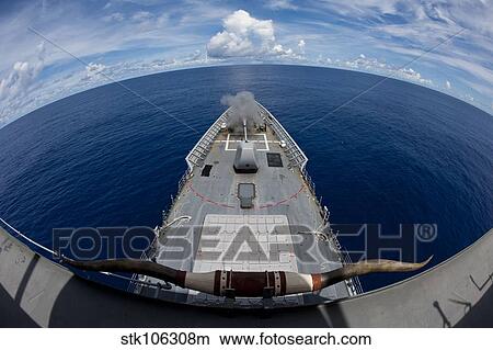 USS Cowpens fires its Mk 45 Mod 2 gun. View Large Photo Image Picture - USS Cowpens fires its Mk 45 Mod 2 gun.. Fotosearch