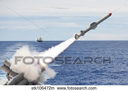 USS Cowpens launches a Harpoon missile from the aft missile deck. View Large Photo Image Picture - USS Cowpens launches a Harpoon missile from the aft missile deck.. Fotosearch