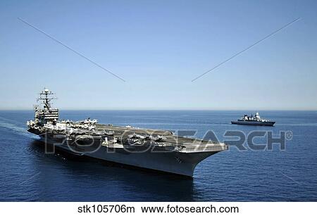 USS Harry S. Truman cruises alongside the German Navy frigate FGS Hessen. View Large Photo Image Picture - USS Harry S. Truman cruises alongside the German Navy frigate FGS Hessen.. Fotosearch