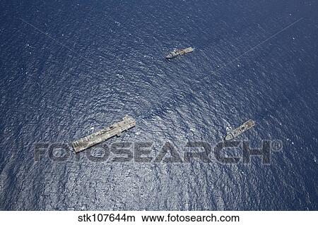 USS Kearsarge, USS Carter Hall and USS San Antonio transit the Red Sea. View Large Photo Image Picture - USS Kearsarge, USS Carter Hall and USS San Antonio transit the Red Sea.. Fotosearch