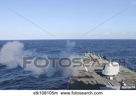 USS Mahan fires a 5-inch gun during a training exercise. View Large Photo Image Picture - USS Mahan fires a 5-inch gun during a training exercise.. Fotosearch