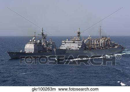USS Vicksburg and USS Supply during a replenishment at sea. View Large Photo Image Picture - USS Vicksburg and USS Supply during a replenishment at sea.. Fotosearch
