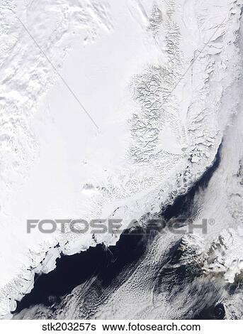 Various types of sea ice congregate along the east coast of Greenland. View Large Photo Image Stock Photograph - Various types of sea ice congregate along the east coast of Greenland.. Fotosearch