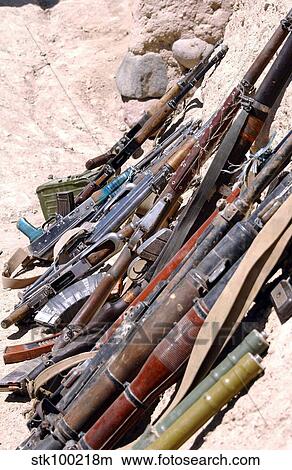 Various weapons, ammunition, and grenades. View Large Photo Image Picture - Various weapons, ammunition, and grenades.. Fotosearch