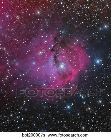 Stock Photograph - vdB 93 is an emission and reflection nebula in Canis Major.. Fotosearch
